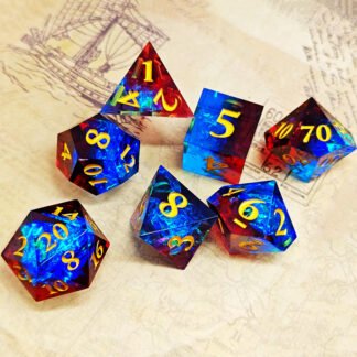 red and blue resin dice with gold numbering