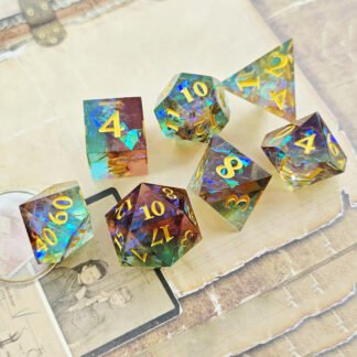 two-tone amber teal resin dice set with gold numbers